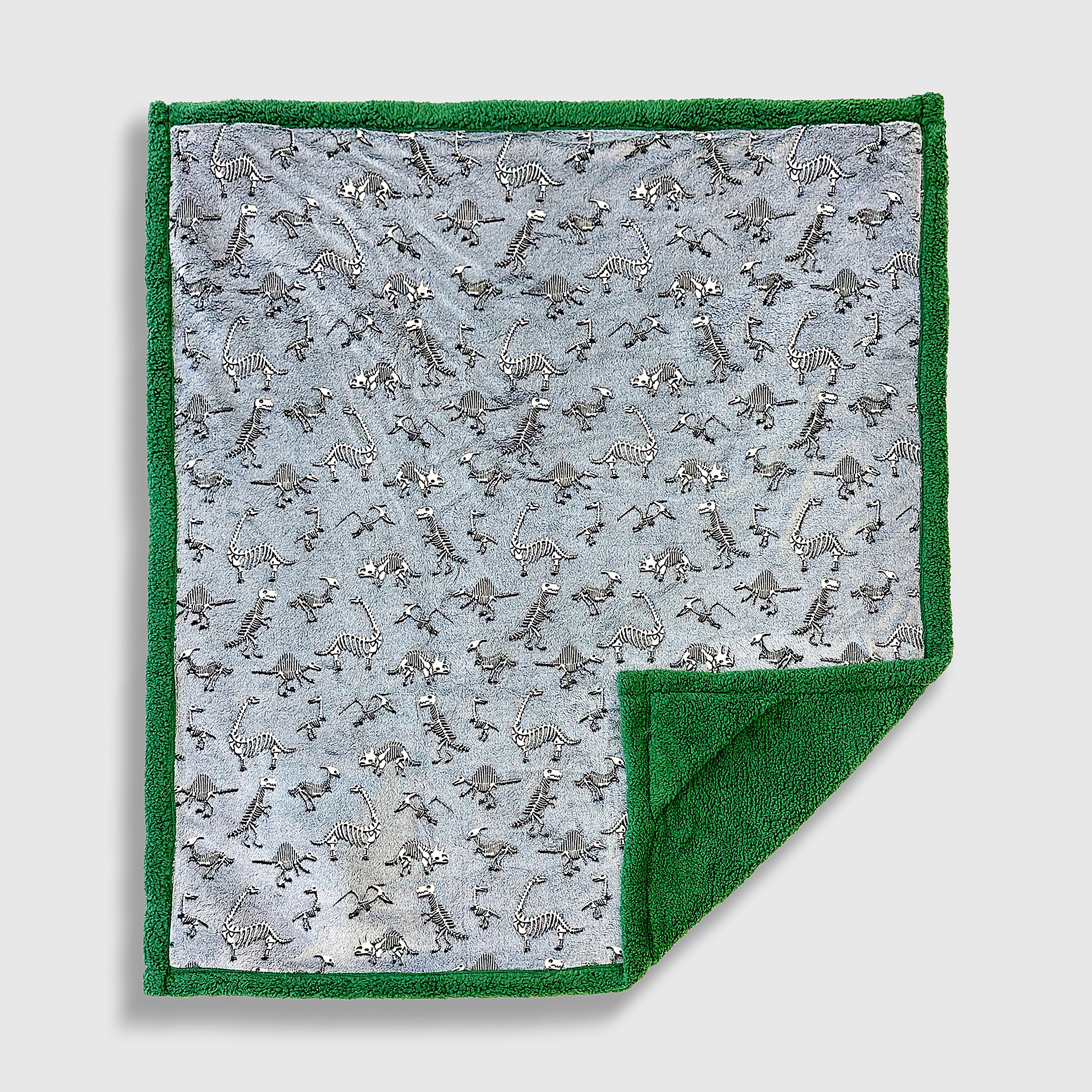 Cozy Switch Blanket – Reversible Sherpa & Glow-in-the-Dark Blanket with Plush Toy Pocket, Glow Dino Bones