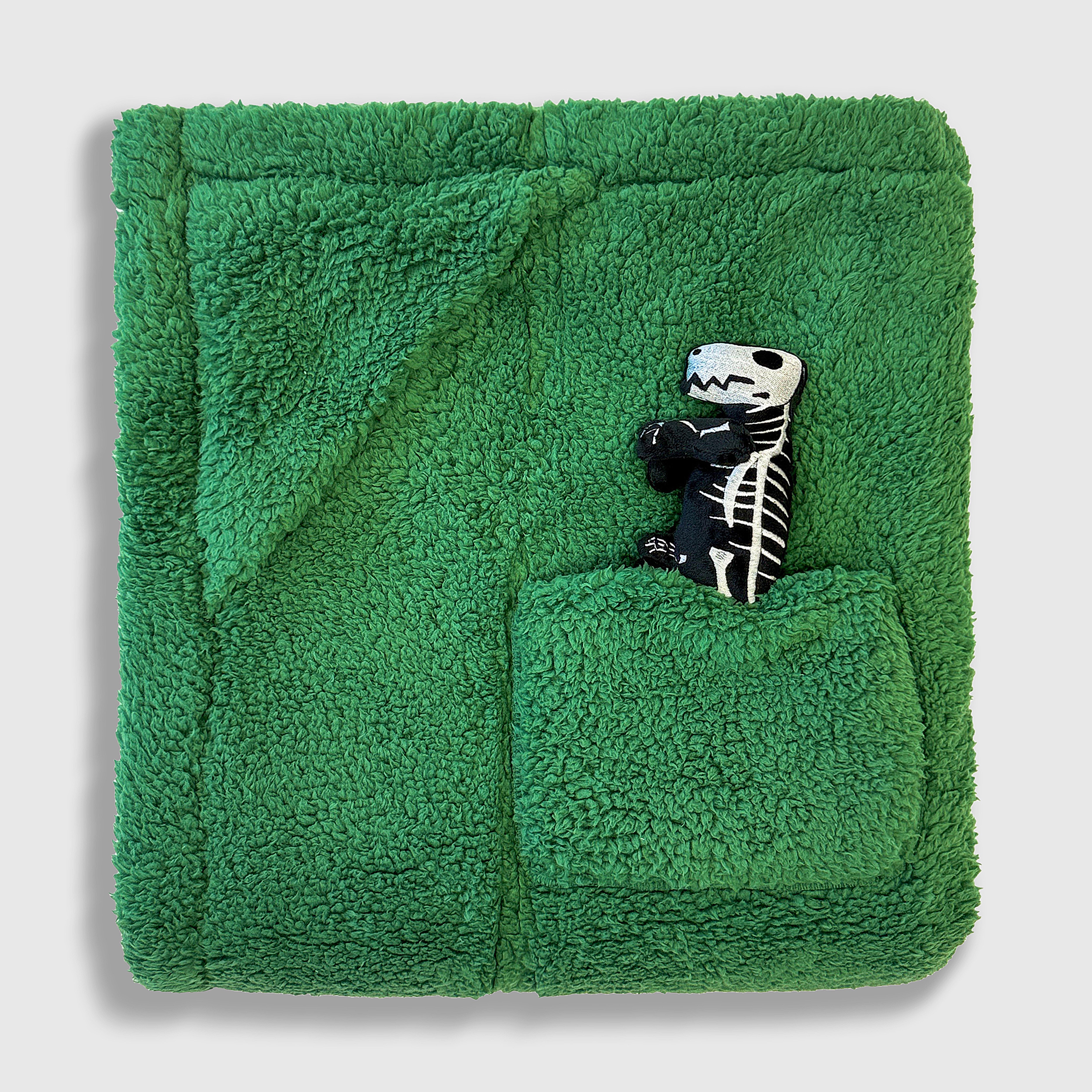 Cozy Switch Blanket – Reversible Sherpa & Glow-in-the-Dark Blanket with Plush Toy Pocket, Glow Dino Bones