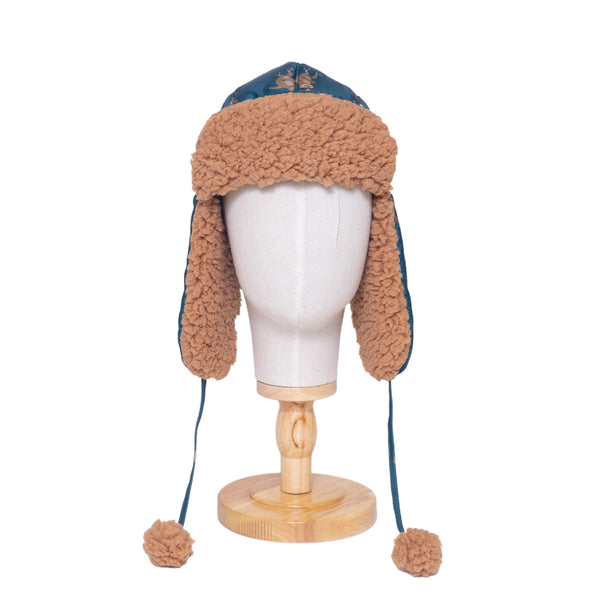 The Cozy Trapper Hat – Skating Sloths Print with Curry Tan Sherpa Liner & Pompoms