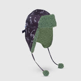 The Cozy Trapper – Dino Bones Print with Katydid Green Sherpa Liner & Pompoms
