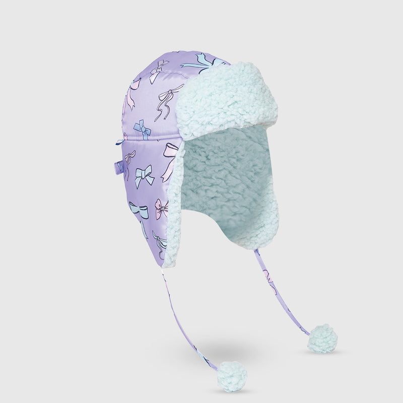 The Cozy Trapper Hat – Bows Print with Pale Aqua Sherpa Liner & Pompoms