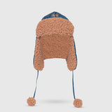The Cozy Trapper Hat – Skating Sloths Print with Curry Tan Sherpa Liner & Pompoms