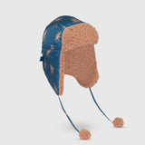 The Cozy Trapper Hat – Skating Sloths Print with Curry Tan Sherpa Liner & Pompoms